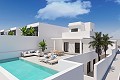 Moderne villa met 4 slaapkamers en 4 badkamers met onderbouw, zwembad en garage in Alicante Property